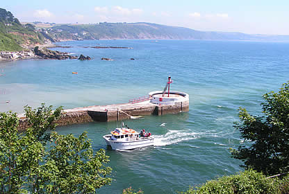 Views over the sandy beach and coast from the famous Looe banjo pier